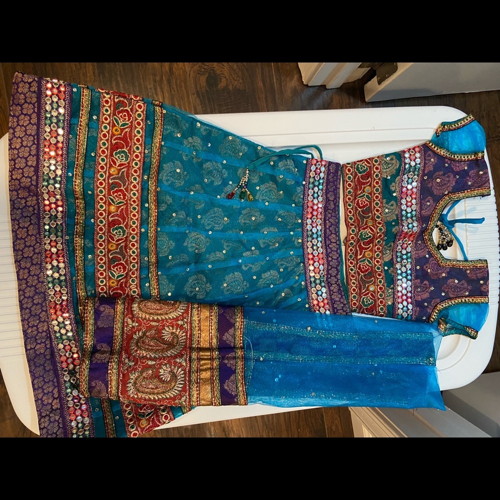 Indian outfit: Lengha/chaniya, choli and dupatta (skirt, top and scarf).